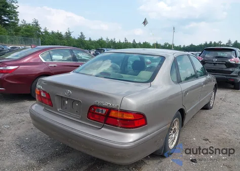 1999 Toyota Avalon Xls z USA, uszkodzony, nr VIN 4T1BF18B2XU333348